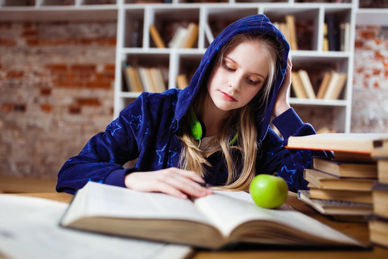 a girl reading a book